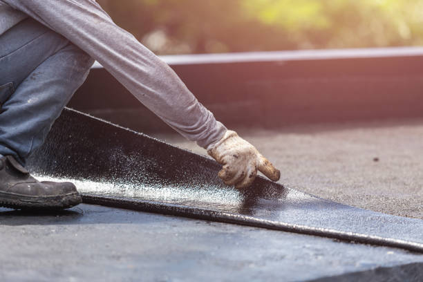 Professional Basement Waterproofing technician working in Lambertville, MI